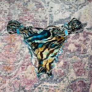 Lulifama size Small bikini bottom. worn 3 times. animal print with blues.